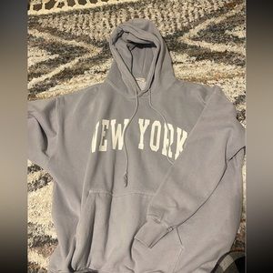 New York sweatshirt 
(fits like a large)
little stains on right sleeve